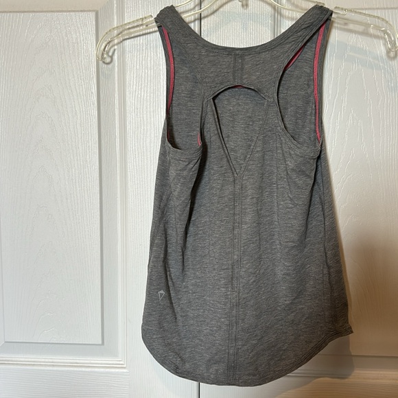 Worn 1X, Ivivva, girls, loose fit tank, shirttail hi-low hem, cut out back - Picture 2 of 6